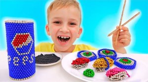 Влад и Никита играют с магнитными шариками