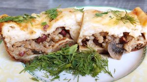 Блины, фаршированные мясным готовым фаршем, в сырной заливке. Были блины стал пирог.