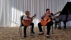 Дуэт гитаристов Стариков Иван - Смирнова Г.А. О.Копенков "Нежные лепестки на лазурной глади"