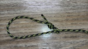 Привязывание шнура к катушке