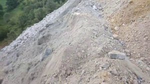 Powerful Komatsu D375A-8 Bulldozer Pushing Large Mterial Over Safety Bank Amzing Machines at Work