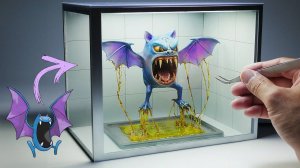 Диорама, изображающая реалистичную летучую мышь-покемона, попавшую в липкую ловушку в лаборатории.