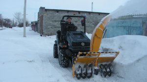 Испытание шнекоротора на передней части трактора с механическим приводом.
