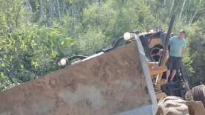 Грейдер Caterpillar 140M в работе