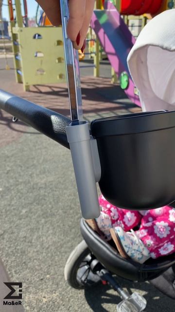 Подстаканник для коляски с отделением для телефона.