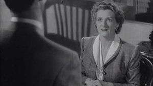 Gladys Cooper with long nails in the film Mr. Lucky (1943)