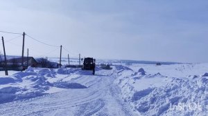 Весна, уборка снега.