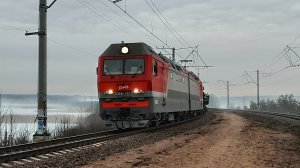 2ЭС6-1612 с грузовым поездом и ДМ62-1845 в хвосте, следует по перегону Пери - Токсово. Пл. Кавголово