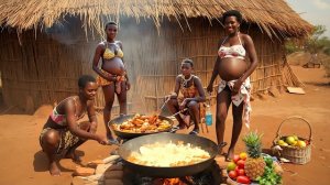 Женщины из африканской деревни готовят завтрак. Вы никогда не пробовали такой аппетитный завтрак.