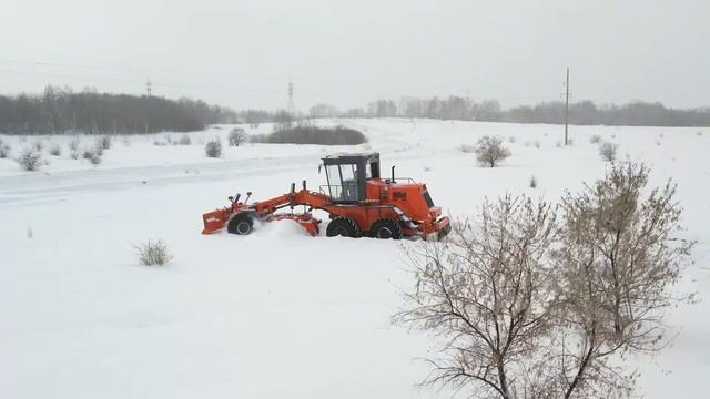 Автогрейдер СДМ-25 в работе.