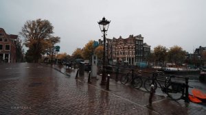 Прогулка под дождем в Амстердаме