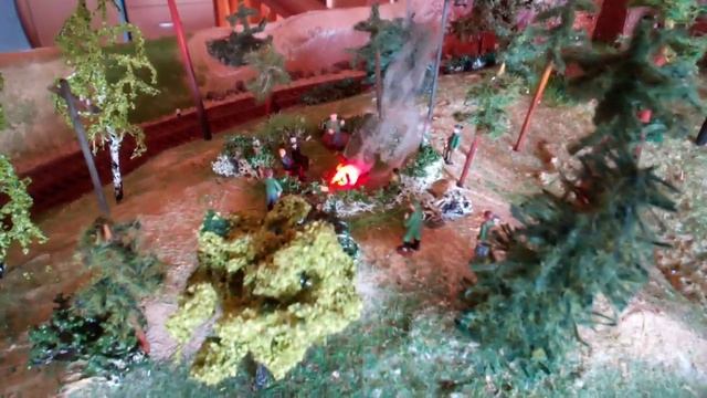 Охотники на привале (действующий костер на макете).