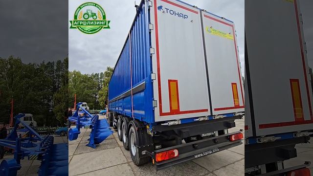 Полуприцеп-зерновоз "9598" с распашными воротами от завода "Тонар"