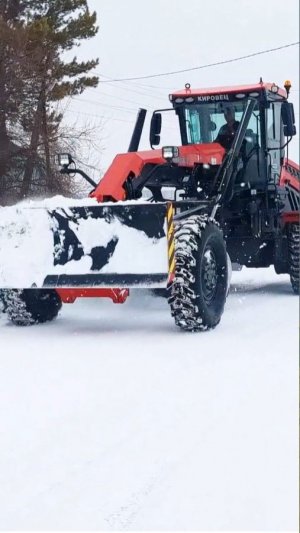 Автогрейдер Кировец К-714 работает в село Титово в Промышленновском м.о., Кемеровской области