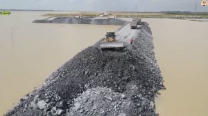 Строительство, дороги через озеро, засыпка