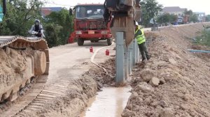 Водяная стена Защитная технология Инженерные подпорные конструкции Шпунтовые сваи Экскаватор Копер