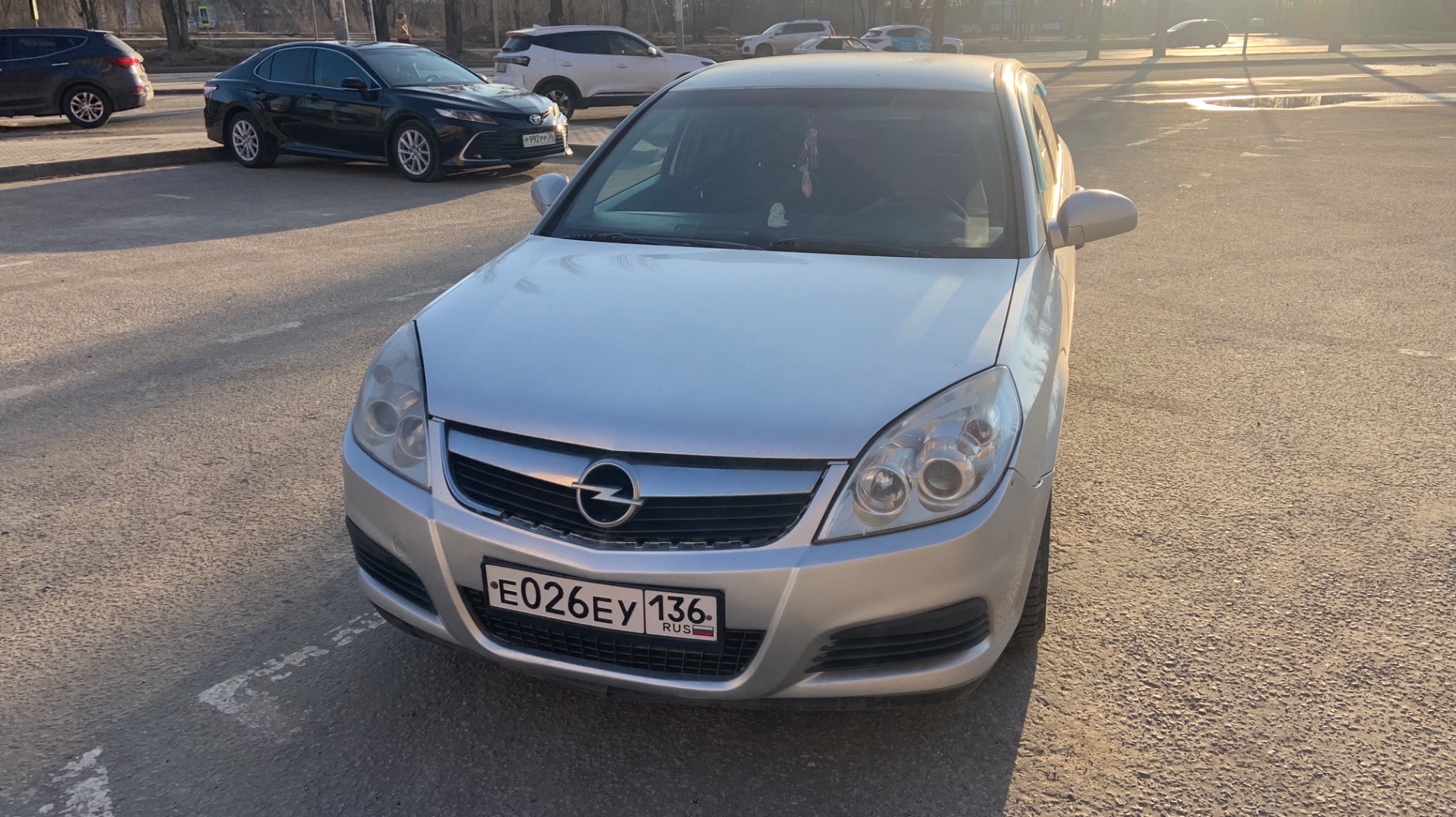 Опель с собачкой на бардачке