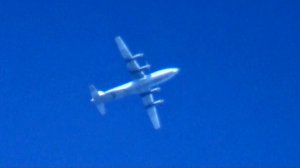 Транспортник Ан-12 на чистом весеннем небе