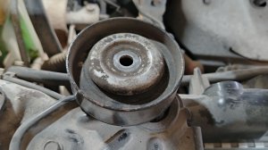 Замена ролика натяжителя ремня генератора Nissan Sanny, Nissan Almera classic, Almera N16.