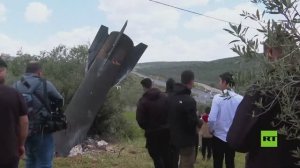 مشاهد لصاروخ لم ينفجر سقط في حقل مفتوح بالضفة الغربية