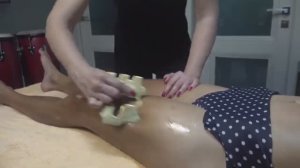 Массаж живота и ног скребком Гуаша