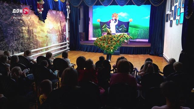 Под светом софитов