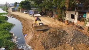 Incredible Start New Project Build New Road,Bulldozer Push Soil Clear Trash in Water,Truck Unloading