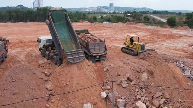 Ultimately Land Filling Operator Dozer Pushing Rocks Vs Dump Truck Dumping Rocks