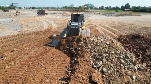 Wonderful SHANTUI DH17 C3 Bulldozer Pushing Soil Fill Deep pit with Heavy Dump truck pouring
