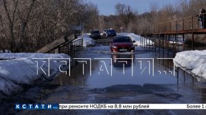 Река Кудьма вышла из берегов и затопила мост, ведущий в посёлок