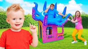 Гигантский осьминог в игровом домике Адама