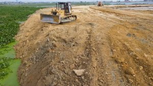 Foundation preparation mission Watch the earth Moving trucks and bulldozers busy clearing the lake