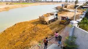 Mud clearing and land expansion techniques Using heavy machinery to prepare construction land