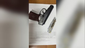 С ПИСТОЛЕТОМ В СУД