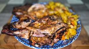 Курица в тандыре, маринованная в изысканных специях.