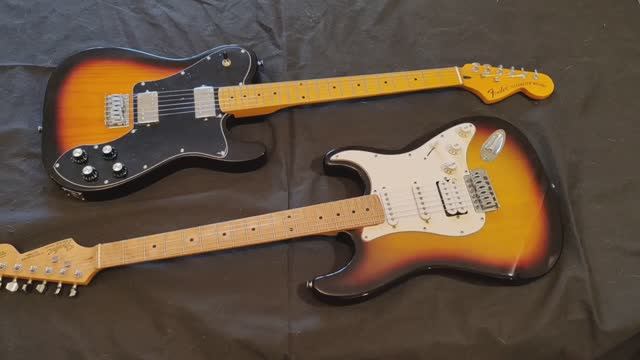 Две гитары не строят по мензуре, но каждая в свою сторону. Чиним.