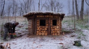Строительство тёплой и уютной бревенчатой хижины.