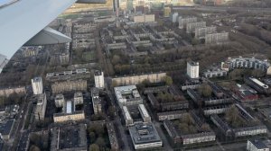 Аэропорт Амстердама. Вид из самолета на город.