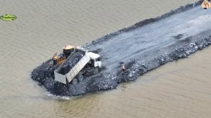 Строительство, засыпка, дорога на озере