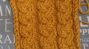 Узор спицами. Плетеная коса