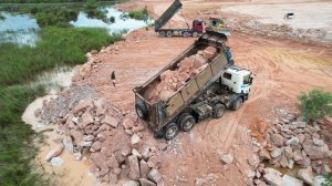 Massive Land Filling Heavy Equipment Operator, Bulldozer Pushing Rocks Mixed Soil Vs Dump Truck
