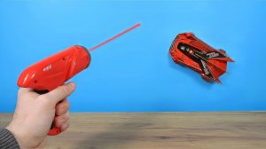 Машинка с лазерным пультом которая ездит по стенам и потолку!