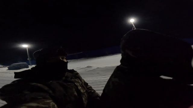 На снегоходах вечером по заснеженному лесу, ХМАО, Сибирь