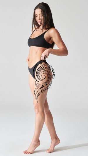 Женская полинезийская татуировка на бедро — что означает каждый элемент