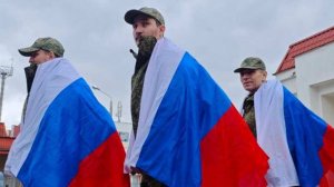 Кадры с возвращенными из украинского плена российскими военными