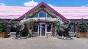 оформление фасада дома входная группа скульптуры Слонов