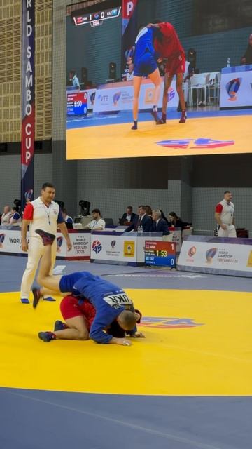One of the first hot throws from Constantin ZOREA (MDA) against Dmytro YEVDOSHENKO (UKR)