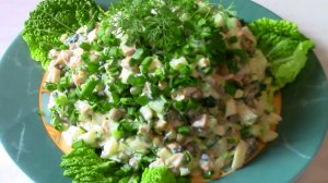 Вкусный салат с кальмарами.