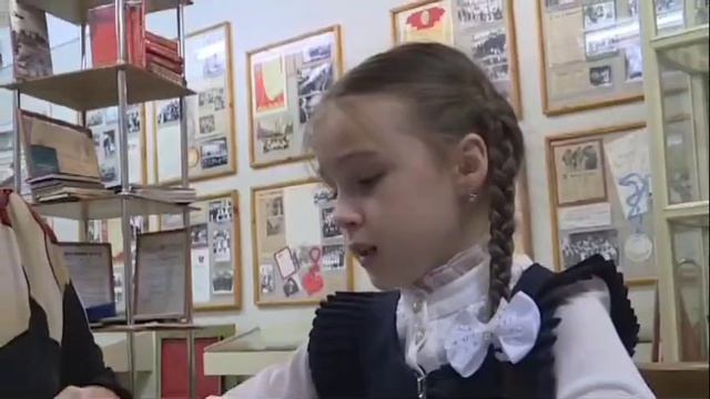 На фотографии в газете