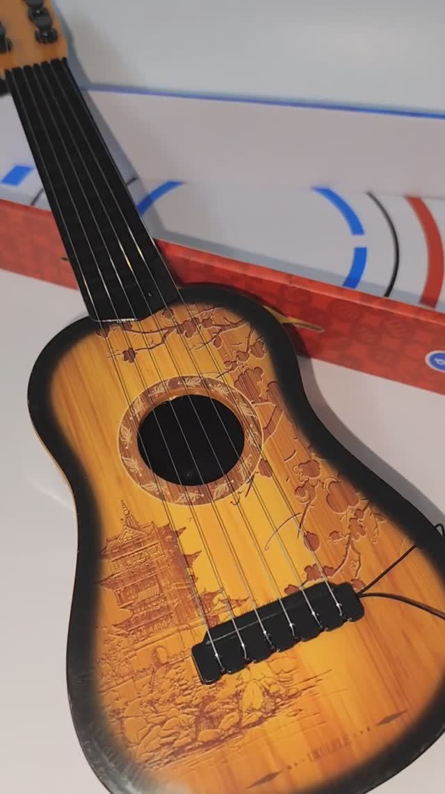 Гитара с шерстью струнами из металла. Детская игрушка.